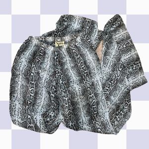 show me your mumu flare snakeskin pants